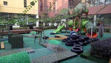 用偽裝網裝飾幼兒園的滑滑梯，孩子們很喜歡